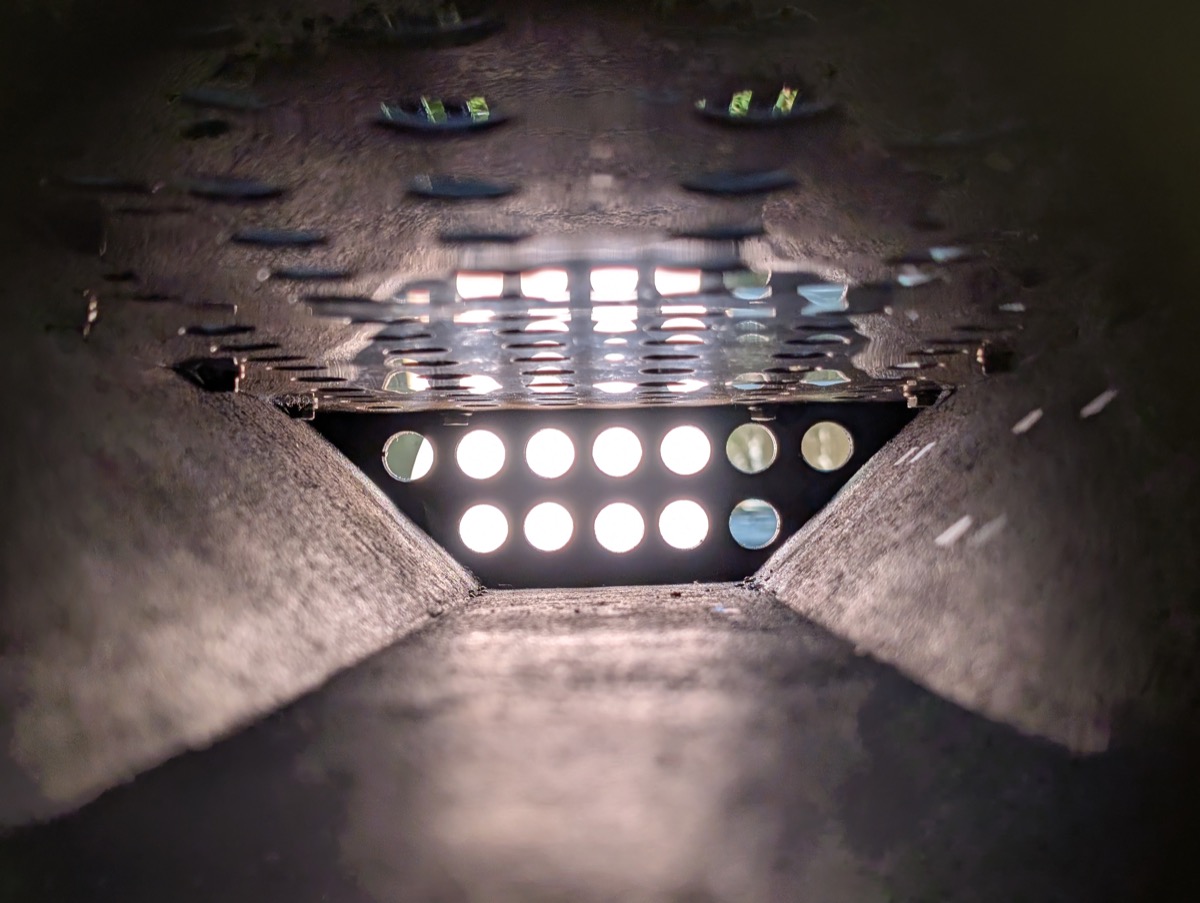 Looking up through the airflow holes and grate from inside the assembled firebox