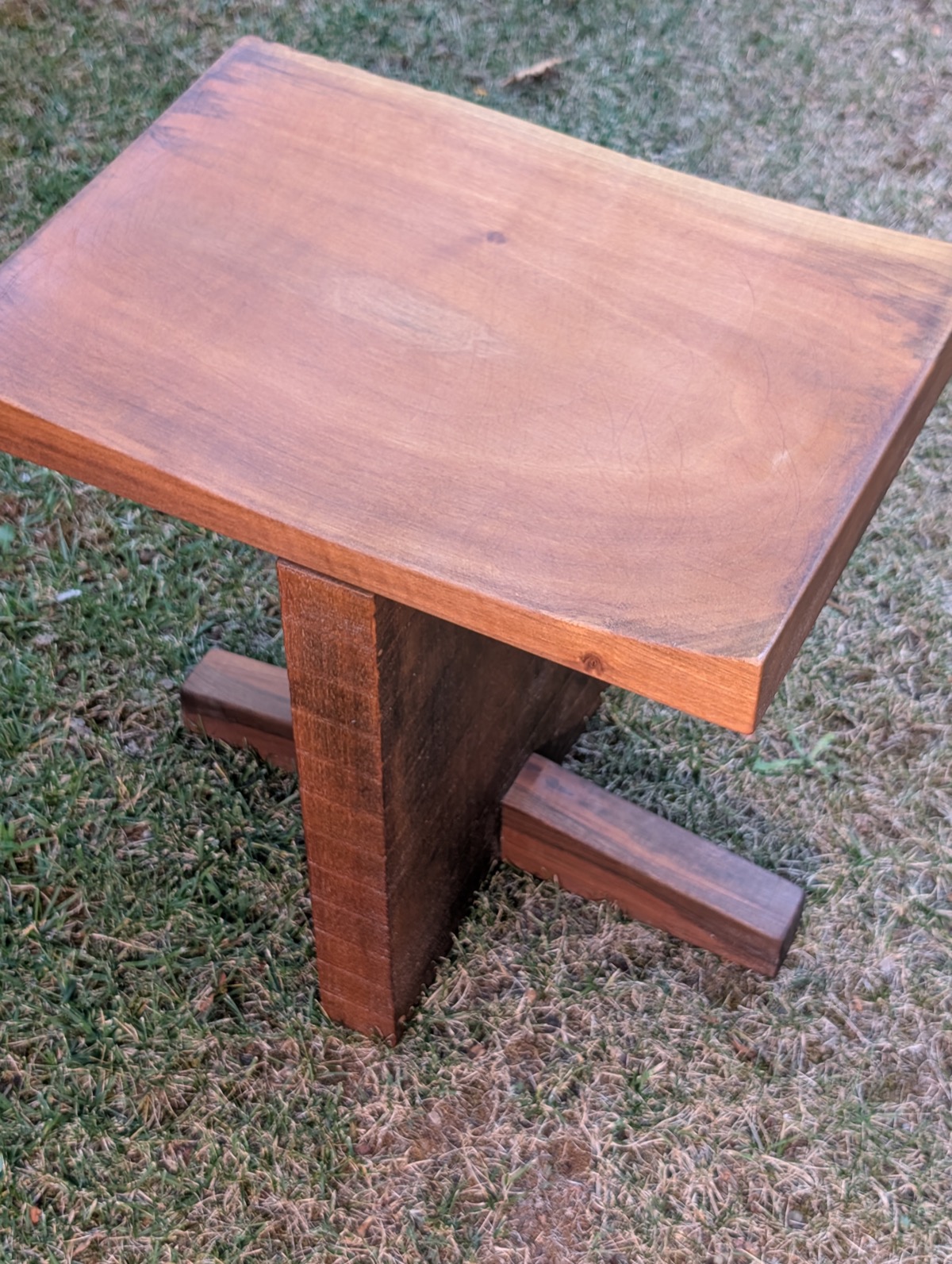 Top down view of the finished seat from the back, showing the curve and the unplaned central leg